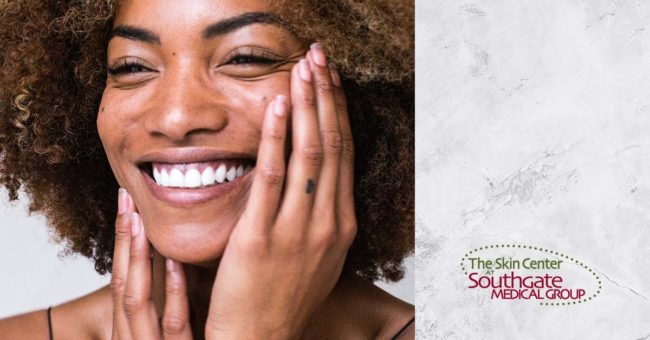 4-WAYS-TO-PREPARE-YOUR-SKIN-FOR-WINTER-WEATHER A lovely young woman with dark sin and a bright smile touches her face as if experiencing the soft and silky skin beneath her fingertips. A Southgate Skin center logo sits in the bottom-right corner.