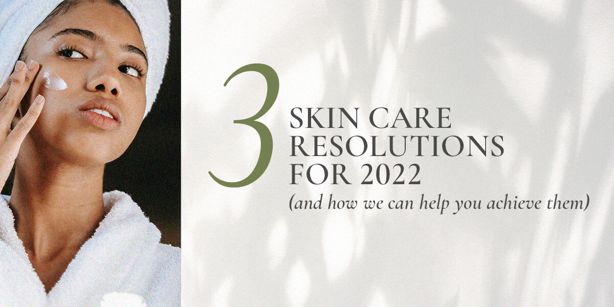 SOUTHGATE_SKIN_CENTER_JAN_BLOG IMAGE: A young woman, wearing a terrycloth towel and head wrap, applies skin care cream to her right cheek. TEXT: 3 Skin Care Resolutions for 2022 (and how we can help you achieve them)