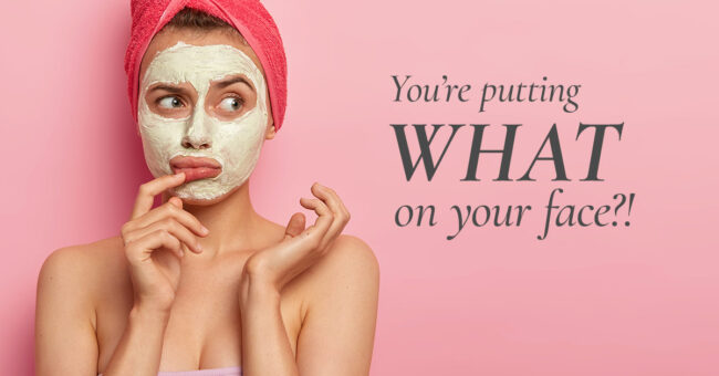 The Skin Center – Skin Care Ingredients The Skin Center: You're putting WHAT on your face?! Image: A light-skinned woman wearing a red towel on her head and her face covered completely in face skin product stands, seemingly nude, from the elbows up, and looks confused.