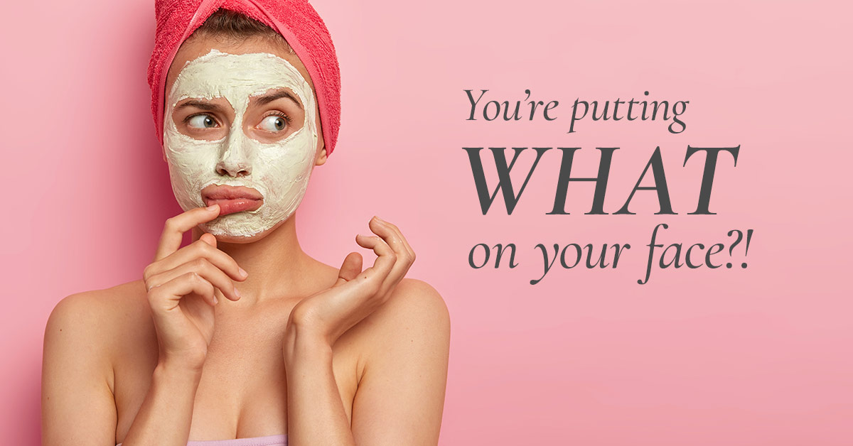 The Skin Center – Skin Care Ingredients The Skin Center: You're putting WHAT on your face?! Image: A light-skinned woman wearing a red towel on her head and her face covered completely in face skin product stands, seemingly nude, from the elbows up, and looks confused.
