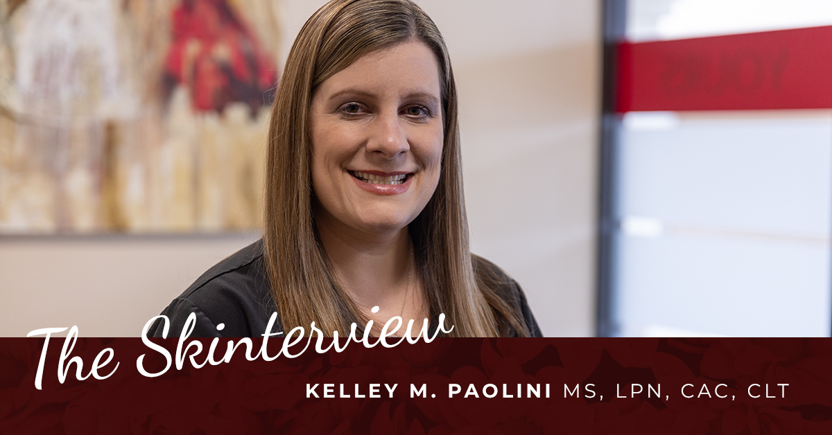 Kelley Paolini_Skin Center The Skinterview: Kelley M. Paolini. A blonde woman, a medical professional, smiles in the lobby of The Skin Center