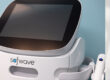 The Skin Center: IMAGE: A Sofwave skin treatment machine displays a blank screen. Four logos display various awards. Read the blog for more.